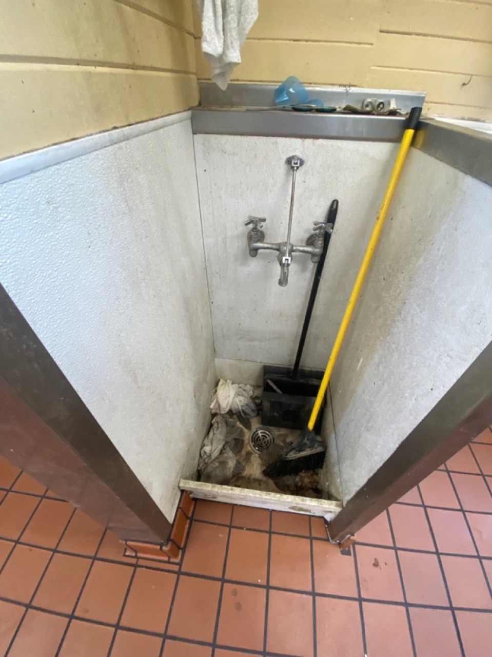 Mop sink before cleaning